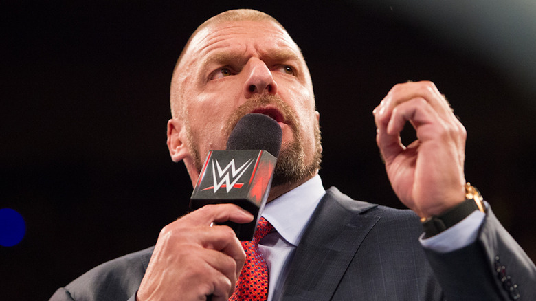 Triple H makes an announcement.