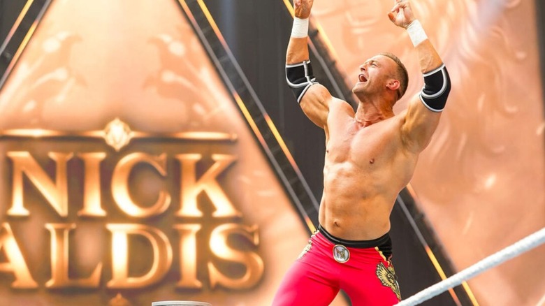 Nick Aldis poses on the ropes for the crowd ahead of his WWE debut match against GUNTHER at WWE SummerSlam 2026.