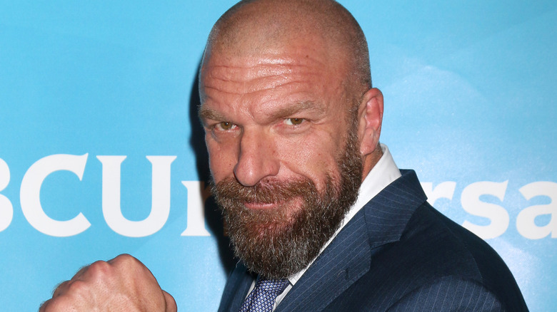 Triple H posing