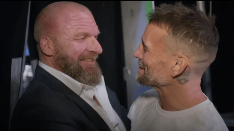Triple H and CM Punk backstage
