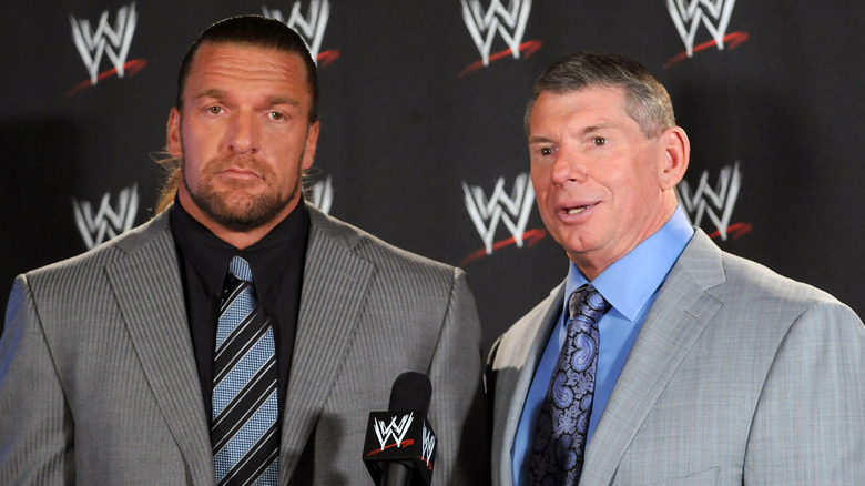Triple H and Vince McMahon attend the World Wrestling Entertainment "Denver Debacle" press conference