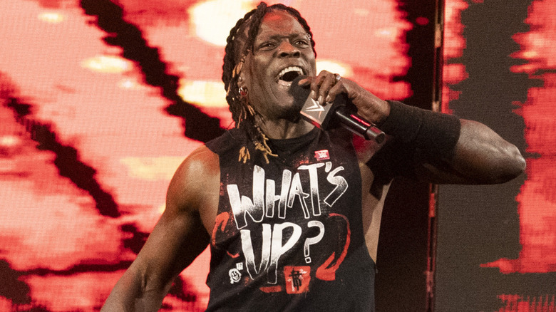R-Truth holding a microphone