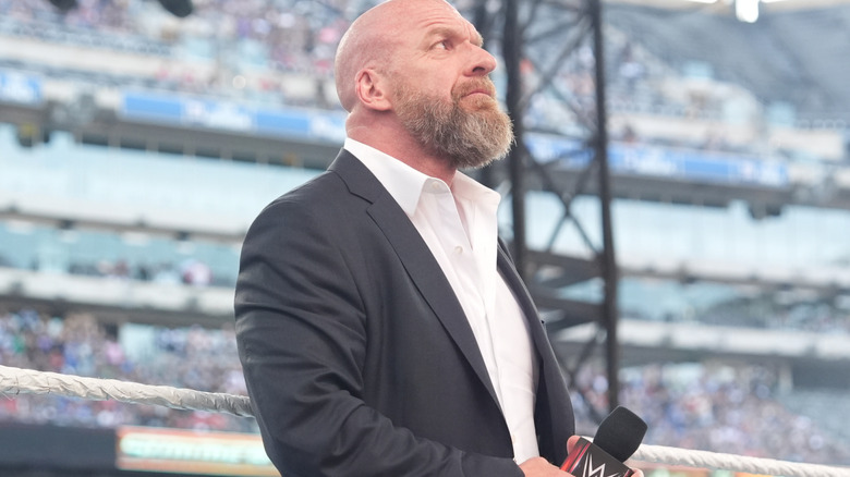triple h standing in the ring at summerslam