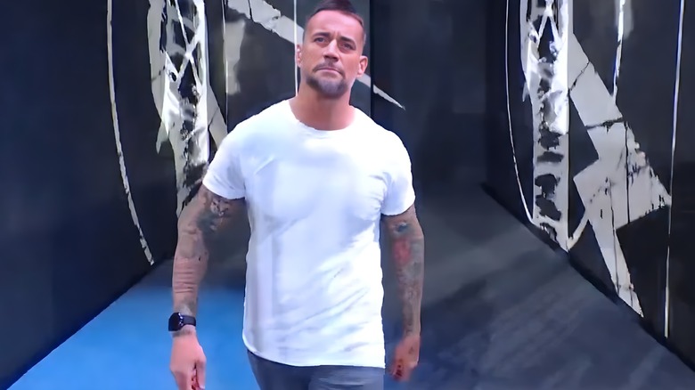 CM Punk returns to WWE, walking down the ramp at Survivor Series: WarGames.