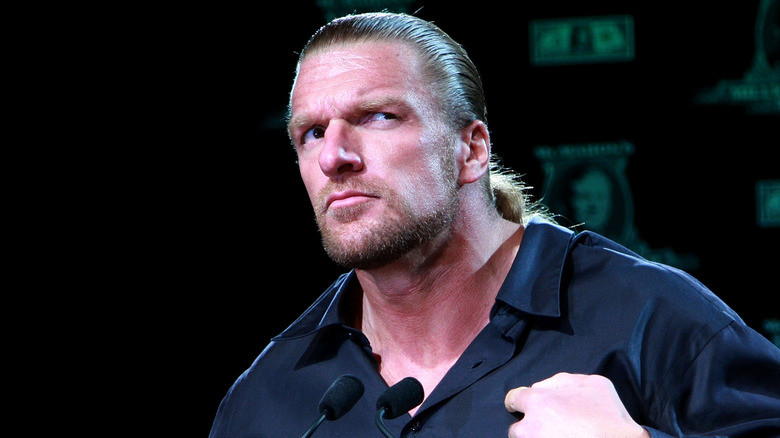 Paul Levesque AKA Triple H making a fake-concerned facial expression