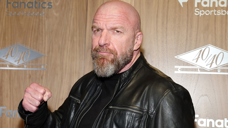 Triple H wearing a black leather jacket