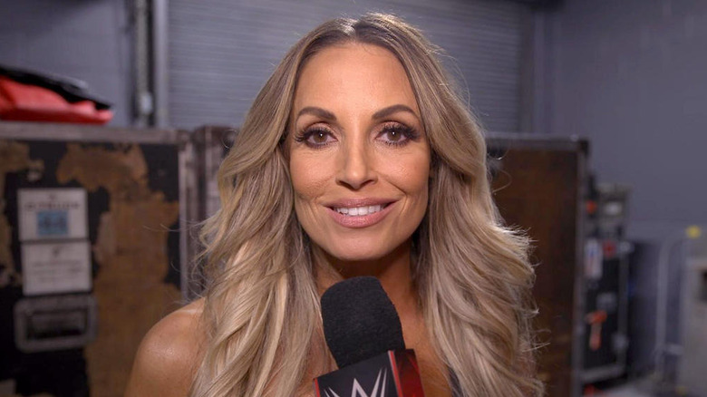 Trish Stratus being interviewed backstage at WWE