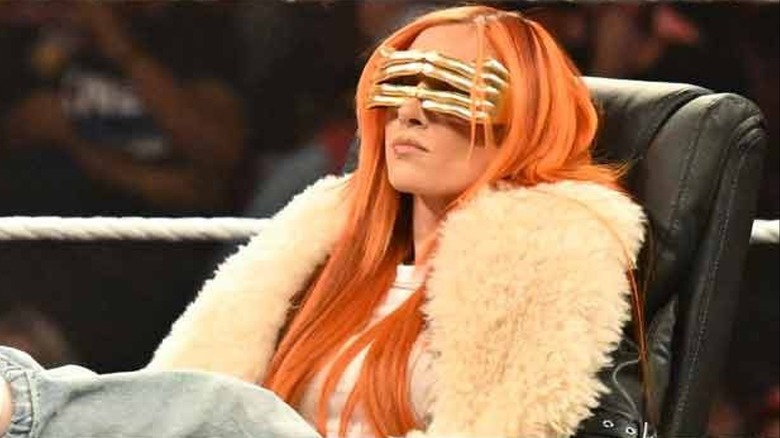 Becky Lynch wearing huge sunglasses