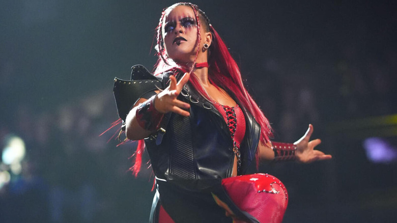 Zaria stares off menacingly during her entrance.