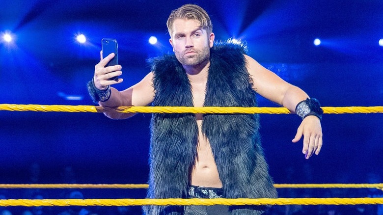 Tyler Breeze poses in the ring 