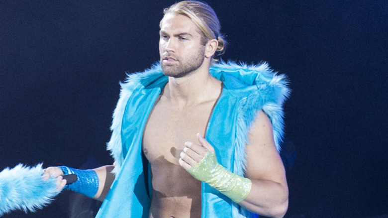 Tyler Breeze is wearing a fur vest