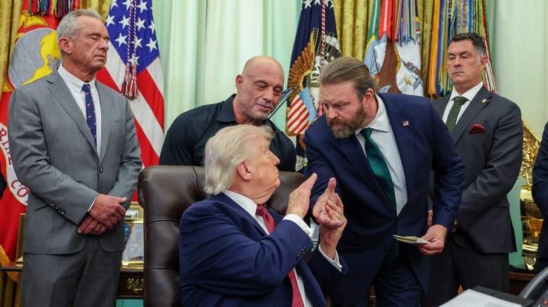 Joe Rogan attends Presidential Executive Order signing with Robert F. Kennedy Jr. and President Trump