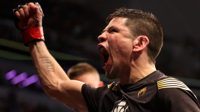 Brandon Moreno celebrates winning UFC Flyweight title