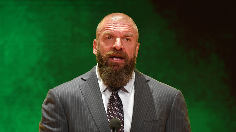 Triple H explaining his interest in signing a UFC fighter