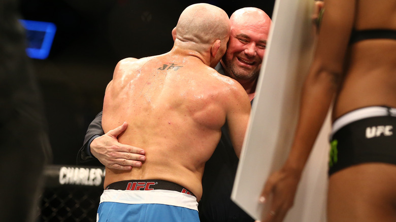 Jesse Taylor hugs Dana White after winning 