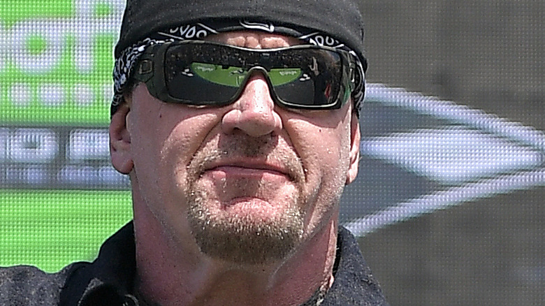The Undertaker posing at a promotional event 