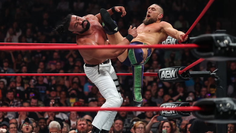 Andrade El Idolo runs into a Bryan Danielson boot