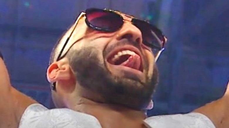 Ariya Daivari sticks out his tongue