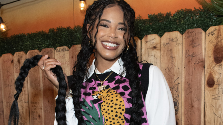 Bianca Belair is smiling