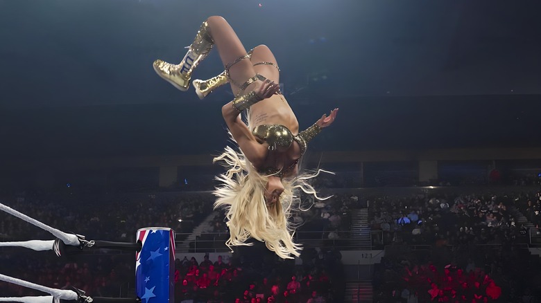 Charlotte Flair flips through the air