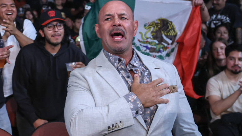 Chavo Guerrero wearing a suit
