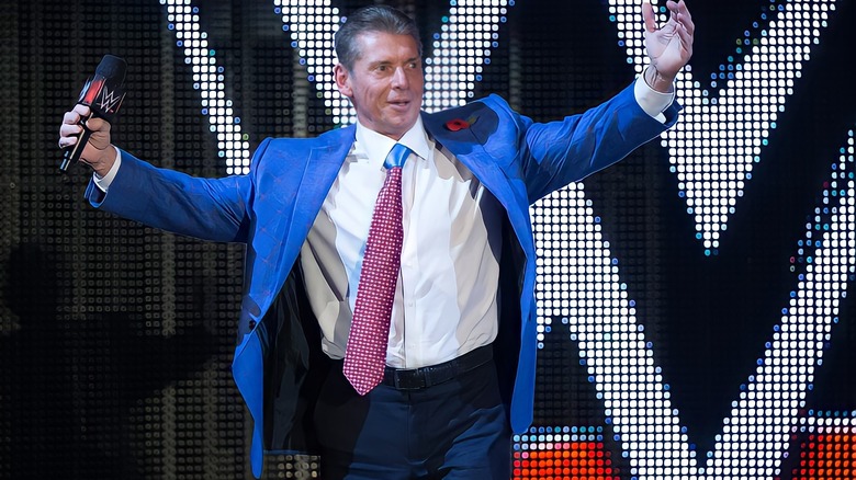 Vince McMahon with arms wide