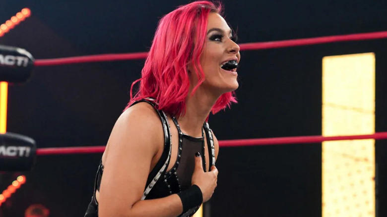 Killer Kelly wearing a black mouth guard