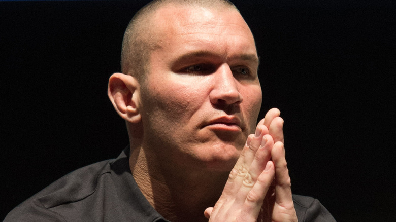 Randy Orton listening