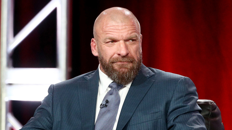 WWE CCO, Triple H, awaits a question during a press conference