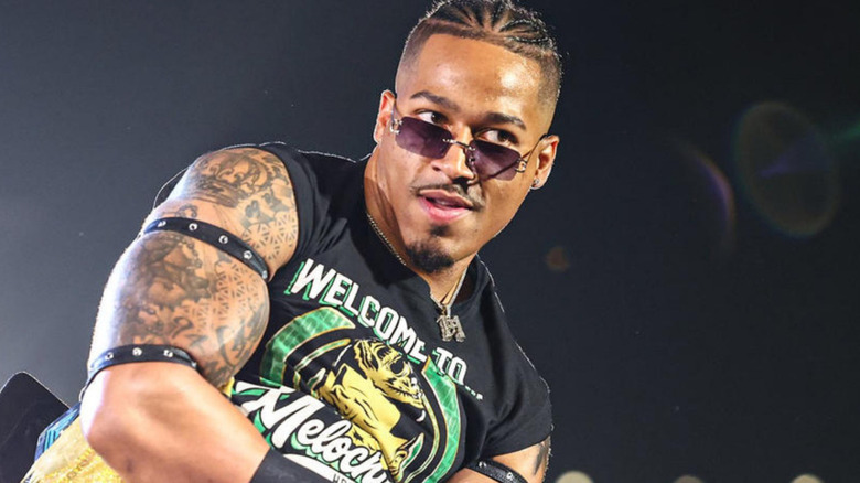 Carmelo Hayes wearing "NXT" Championship