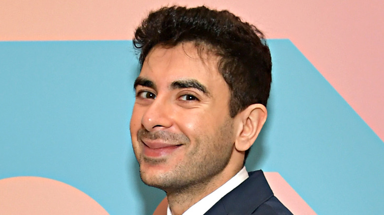 Tony Khan smiles