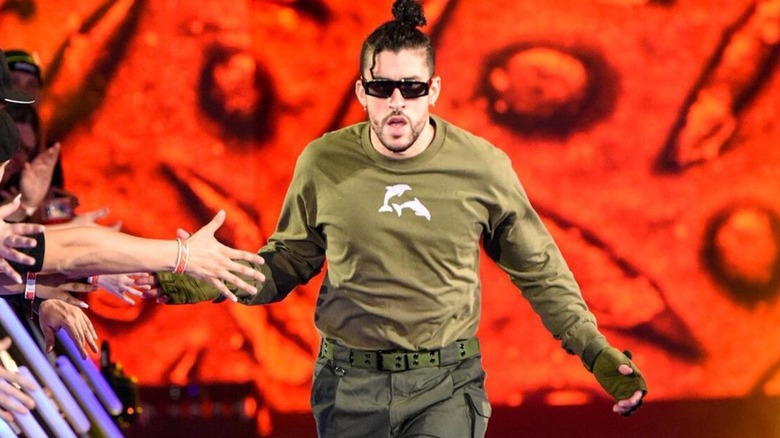 Rapper Bad Bunny heads down the ramp to the ring to enter the Royal Rumble match in 2022.