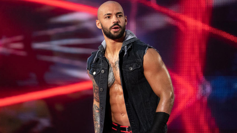 Ricochet wearing a sleeveless jacket