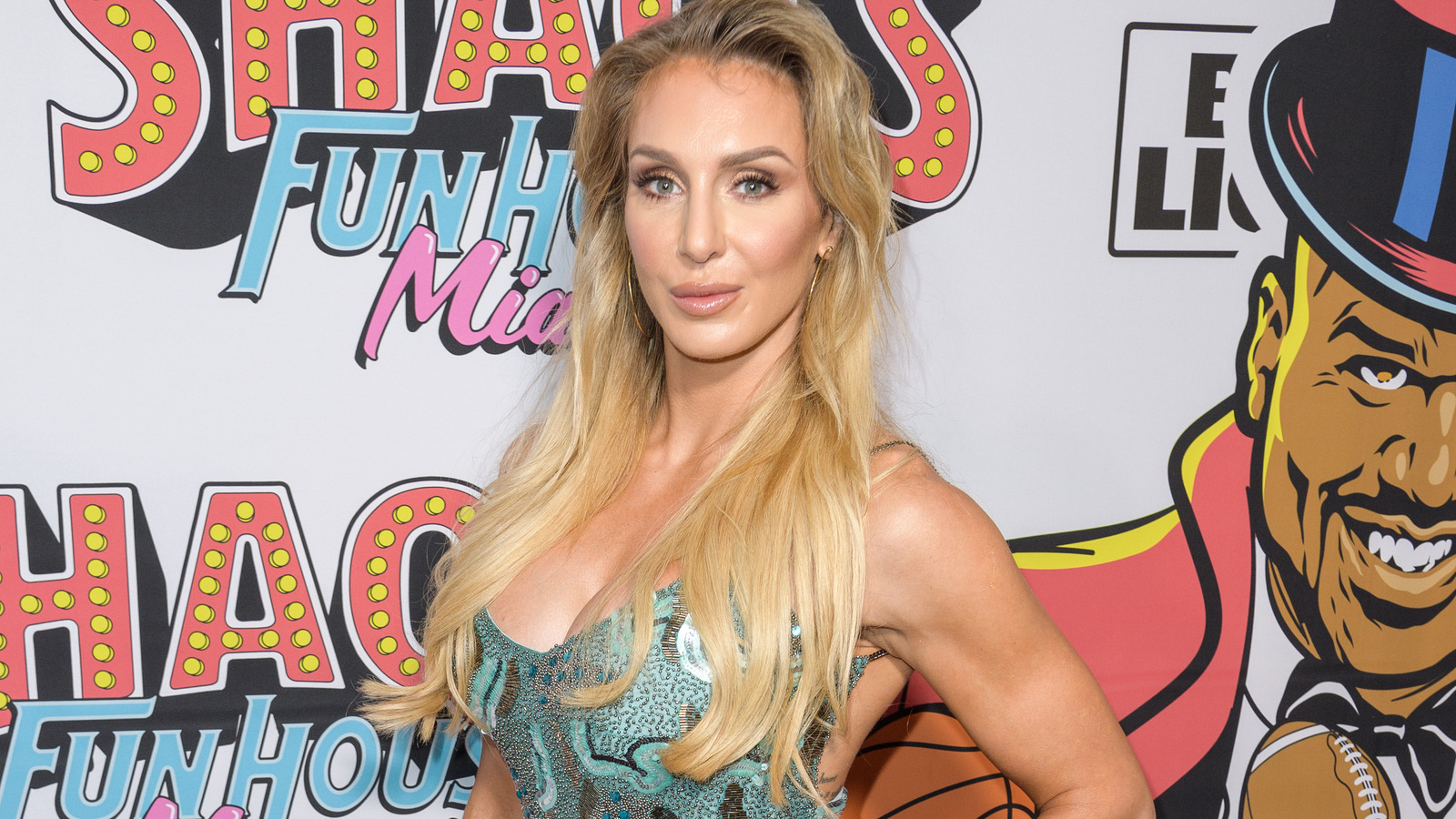 WWE Star Charlotte Flair Shares Clip Using Belt Squat Machine In The Gym WWE Star Charlotte Flair Shares Clip Using Belt Squat Machine In The Gym