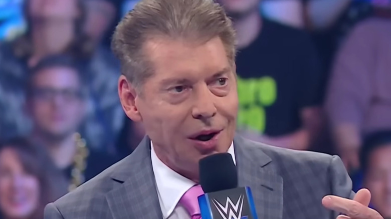 Vince McMahon speaking in the ring
