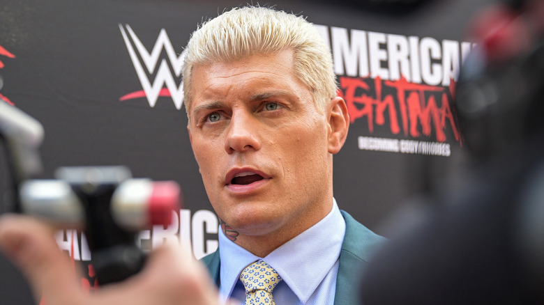 Cody Rhodes surrounded by cameras