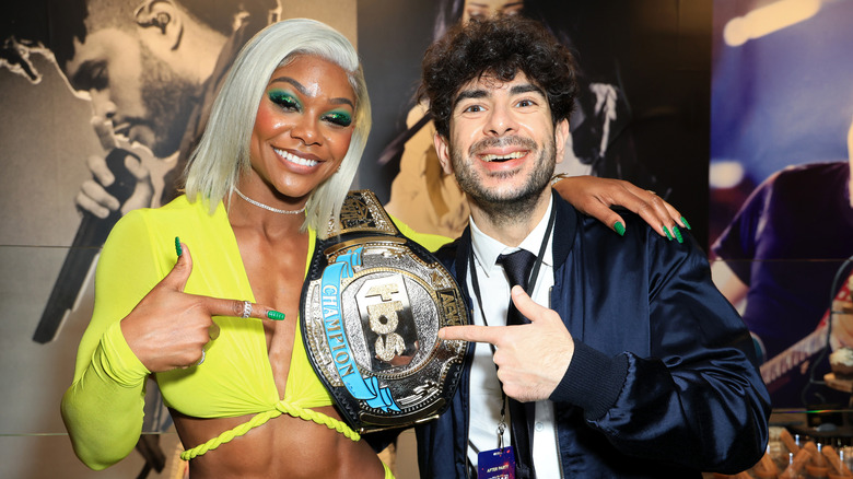 Jade Cargill and President of All Elite Wrestling Tony Khan attend TBS's AEW Dynamite Los Angeles Debut After Party at The Forum on June 01, 2022 in Inglewood, California.
