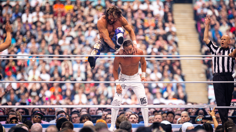 Kenny Omega wrestling Jay White