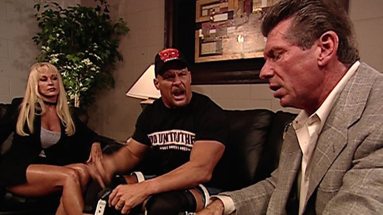 Steve and Debra Austin in a backstage segment with Vince McMahon