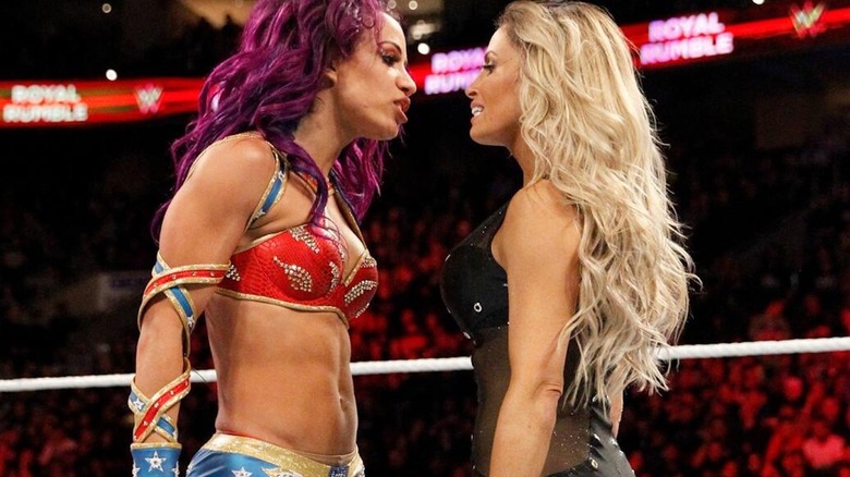 Sasha Banks stares down Trish Stratus in the first-ever women's Royal Rumble match