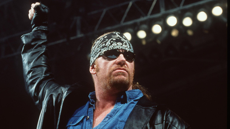 Mark Calaway AKA The Undertaker raising his fist in the air