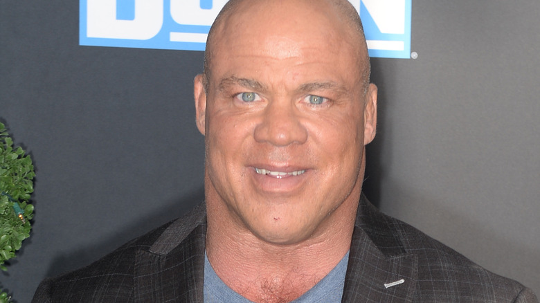 Kurt Angle smiles at a press event for WWE