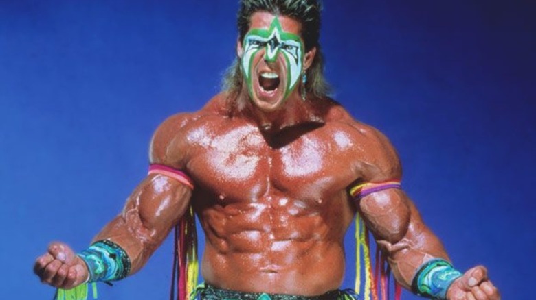 The Ultimate Warrior screming in promotional photo