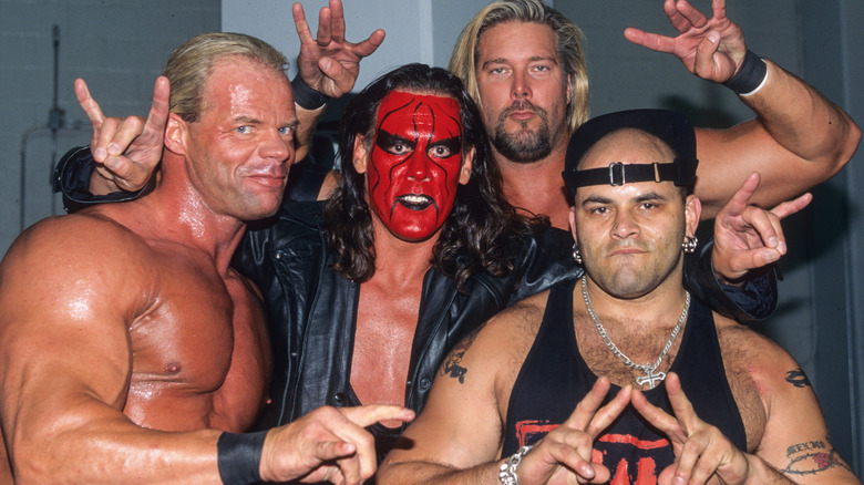 The nWo Wolfpac, some of whom are throwing up the Too Sweet