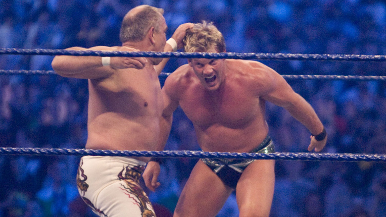Ricky Steamboat prepares to punch Chris Jericho