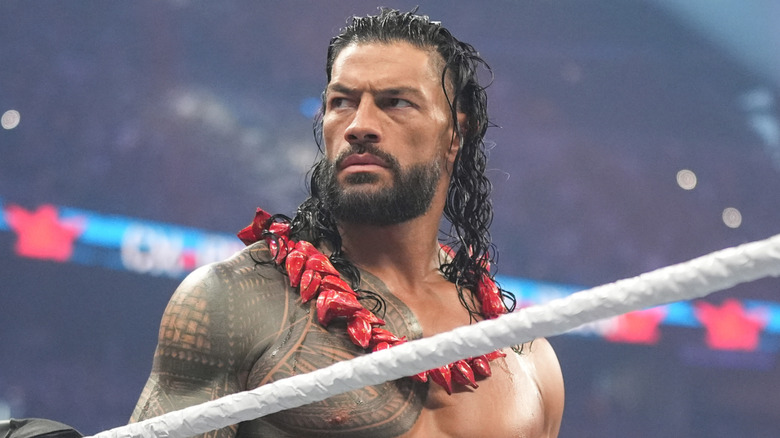 Roman Reigns wearing the ula'fala with an intense facial expression