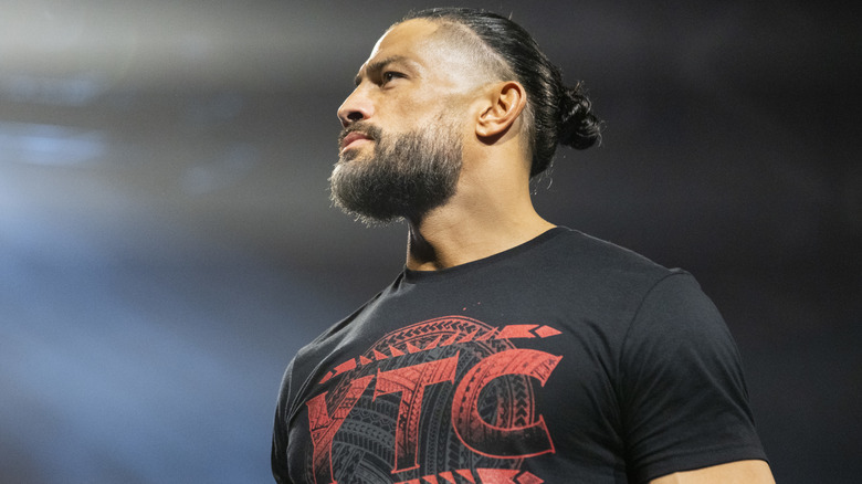 Roman Reigns wearing a tribal chief t-shirt