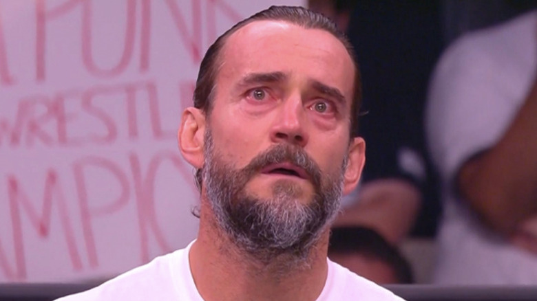 CM Punk with a sad expression 