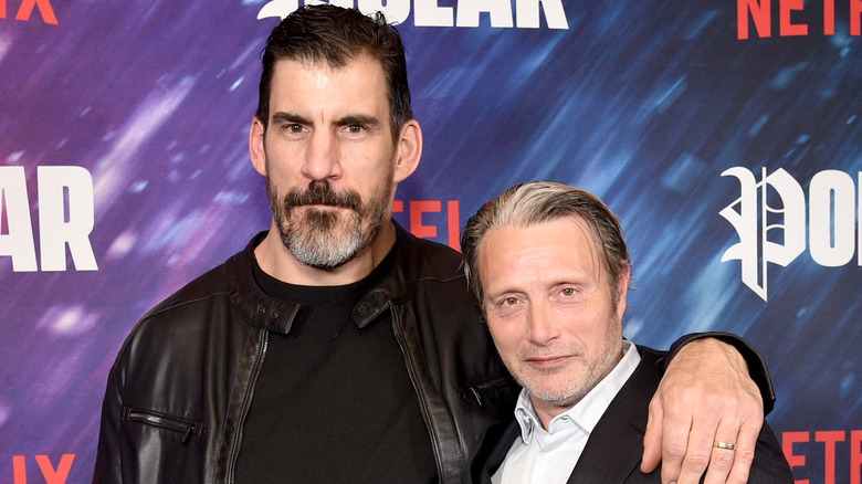 Robert Maillet next to actor Mads Mikkelsen