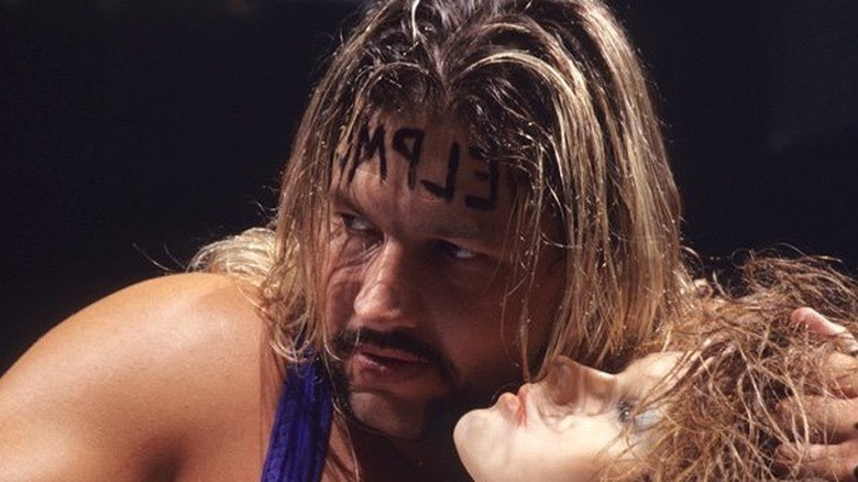 Al Snow holding Head
